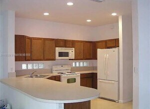 1309 Alicante Ct in Riviera Beach, FL - Building Photo - Building Photo