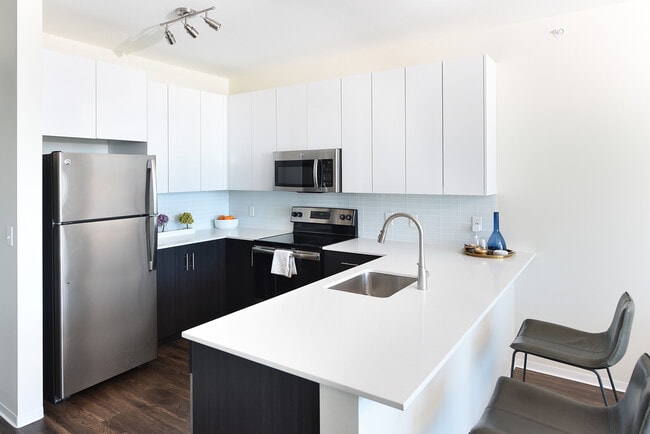 Two Twelve Clayton in Clayton, MO - Building Photo - Building Photo