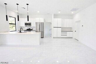 2522 Alice Pl in Lehigh Acres, FL - Building Photo - Building Photo