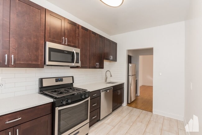 1212 W Lunt Ave, Unit 102 in Chicago, IL - Foto de edificio - Building Photo