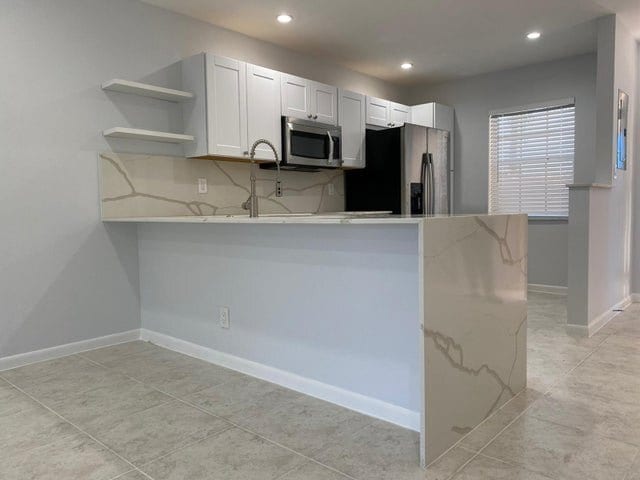 property at 9973 Three Lakes Cir