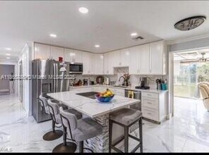 3954 Coconut Cir N in Naples, FL - Building Photo - Building Photo