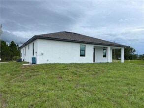 821 Newell St E in Lehigh Acres, FL - Building Photo - Building Photo