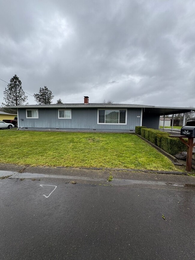 property at 401 NW Tumlin Ave