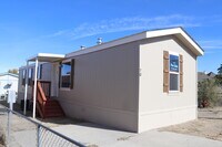 Carriage Court Manufactured Home Community in Winnemucca, NV - Building Photo - Building Photo