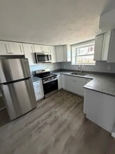 85 Indian Run Rd, Unit 1 in Bellingham, MA - Foto de edificio - Building Photo