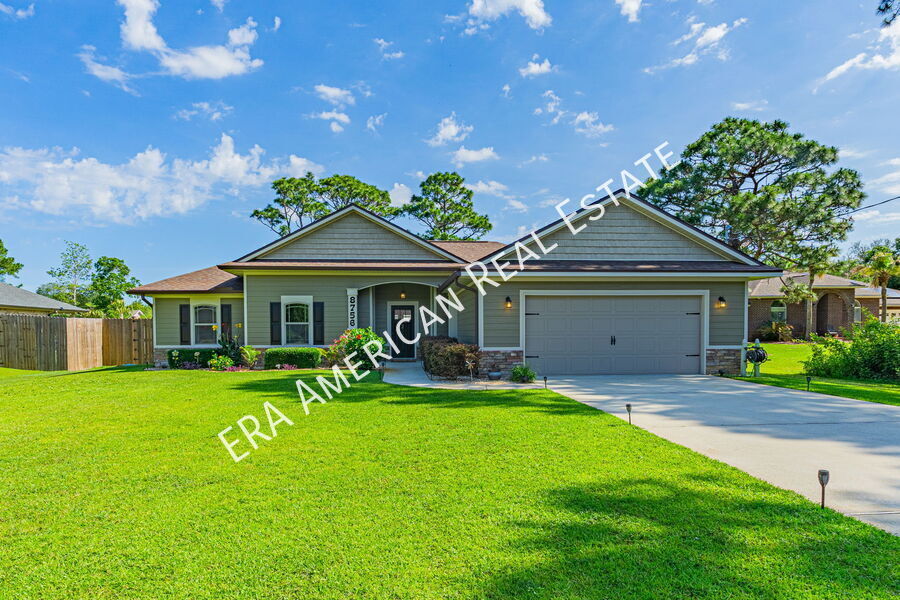 8756 El Paseo St in Navarre, FL - Building Photo