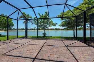 14940 Edgewater Cir in Naples, FL - Building Photo - Building Photo