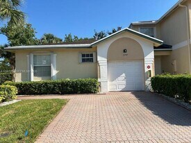 11707 NW 47th Dr in Coral Springs, FL - Building Photo