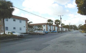 Poulos Village Apartments in Lantana, FL - Building Photo - Building Photo