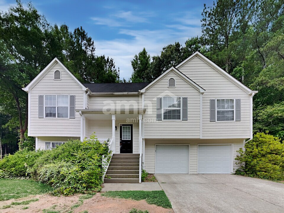 6028 Woodcreek Dr in Woodstock, GA - Building Photo