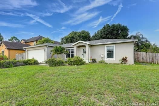 property at 6250 NW Hacienda Ln