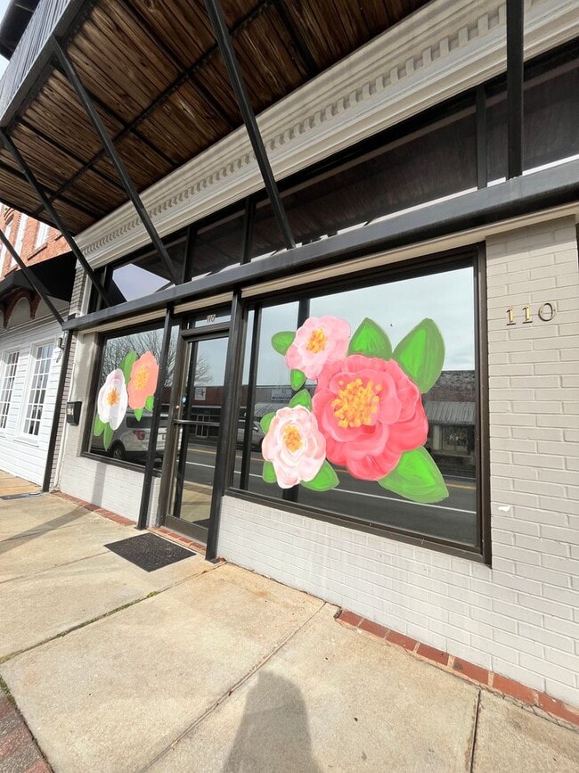 property at 110-A E Commerce St