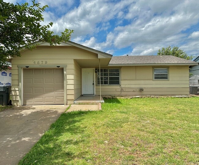 property at 4679 NW Ozmun Ave