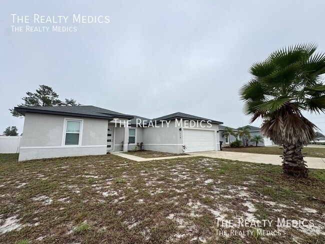 119 Lily Ln in Poinciana, FL - Building Photo - Building Photo