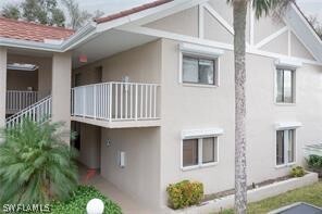 9627 Eaton Gardens Ln-Unit -107 in Ft. Myers, FL - Foto de edificio