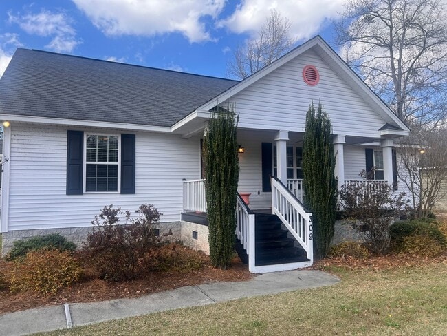 property at 309 White Magnolia Ave