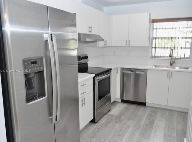 property at 13492 SW 38th Ln