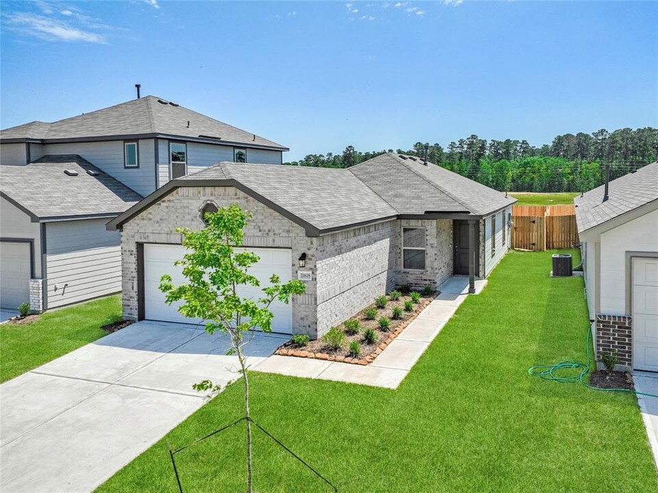 11618 Lazy Oak Crk Dr in Magnolia, TX - Foto de edificio