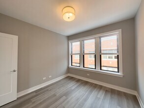 3924 N Janssen Ave, Unit A05W in Chicago, IL - Building Photo - Building Photo