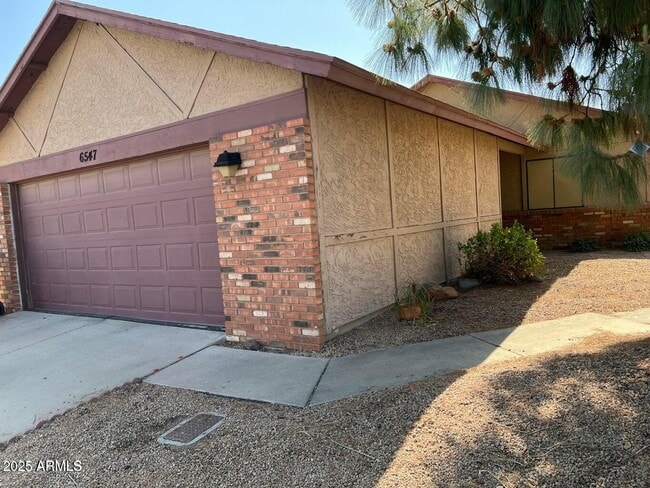 property at 6547 W Poinsettia Dr