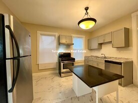 10 Bucknam St, Unit 1 in Boston, MA - Building Photo