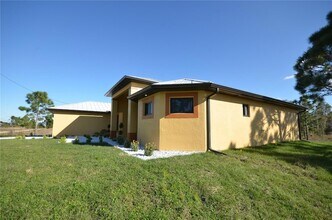 1242 Hathor St E in Lehigh Acres, FL - Building Photo - Building Photo