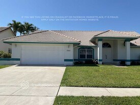 7062 St Clair Ct in Greenacres, FL - Building Photo