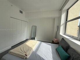 111 E Flagler St, Unit 707 in Miami, FL - Building Photo