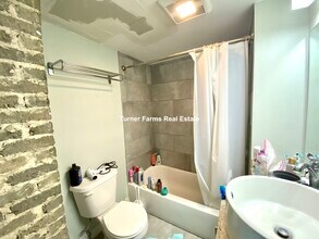 9 Arlington St, Unit 1 in Somerville, MA - Foto de edificio - Building Photo