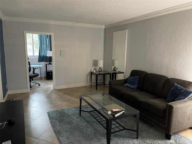 6075 N Sabal Palm Blvd, Unit 205 in Tamarac, FL - Building Photo - Building Photo