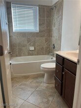 10100 Tin Maple Dr in Estero, FL - Building Photo - Building Photo