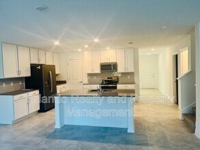 1910 Birnham Wood Bnd in Kissimmee, FL - Building Photo - Building Photo