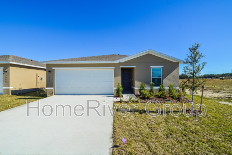 2013 Iowa Dr in Sumterville, FL - Building Photo