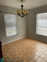 5871 Woodland Point Dr in Tamarac, FL - Building Photo - Building Photo