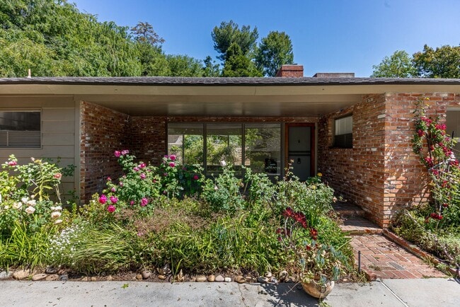 Classic Mid-Century home moments from Fryman Canyon, Unit E102 in Los Angeles, CA - Building Photo - Building Photo
