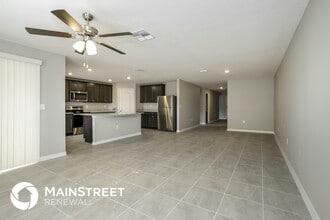 1698 Hideaway Flat St in Mascotte, FL - Building Photo - Building Photo