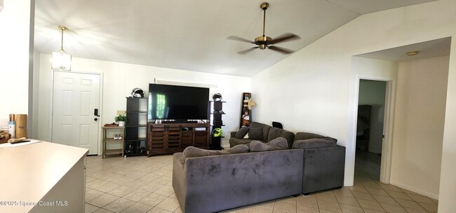 7746 Mango Grove Ave in Melbourne, FL - Building Photo - Building Photo