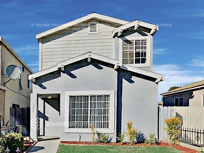property at 1277 W 33rd St