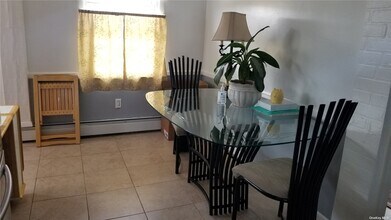 18 Julian Pl-Unit -upper in Island Park, NY - Building Photo - Building Photo