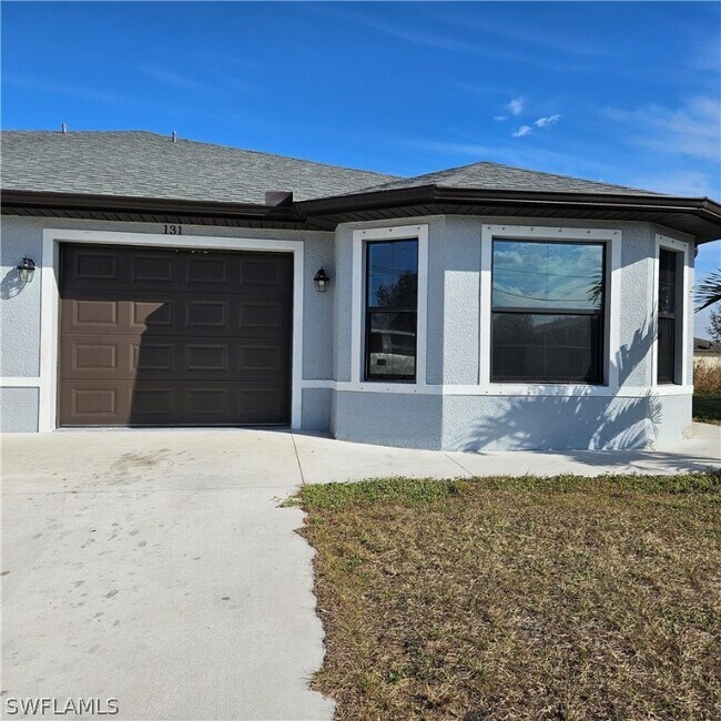 131 Gilbert Ave S in Lehigh Acres, FL - Building Photo - Building Photo