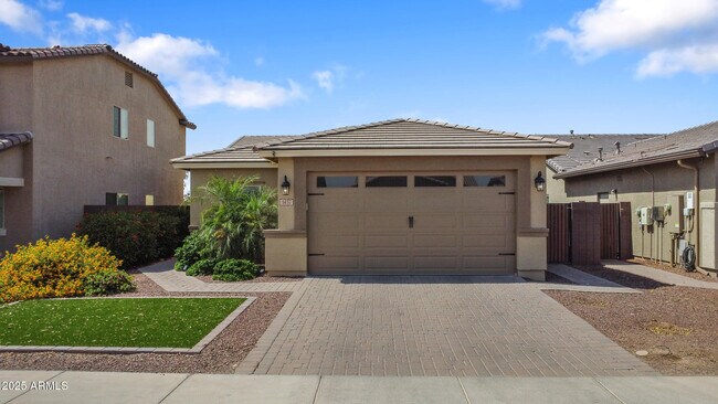 property at 1437 W Smoke Tree Ave