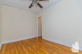 411 W Roscoe St, Unit 410 in Chicago, IL - Building Photo - Building Photo