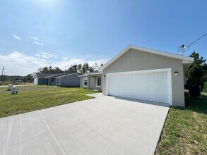 8 Malauka Pass Way in Ocklawaha, FL - Building Photo - Building Photo