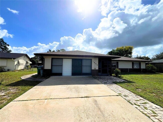 1449 Woffington Ave in Deltona, FL - Foto de edificio - Building Photo