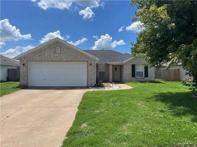 property at 6105 SW Meadow Well Ave