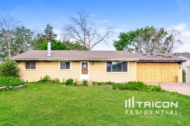 property at 7013 Knox Ave N