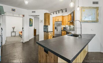 8211 Station Village Ln, Unit 1201 in San Diego, CA - Building Photo - Building Photo