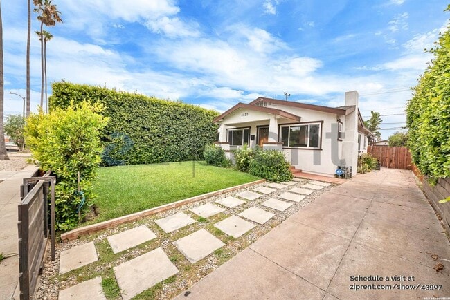 5150 S Manhattan Pl in Los Angeles, CA - Foto de edificio - Building Photo