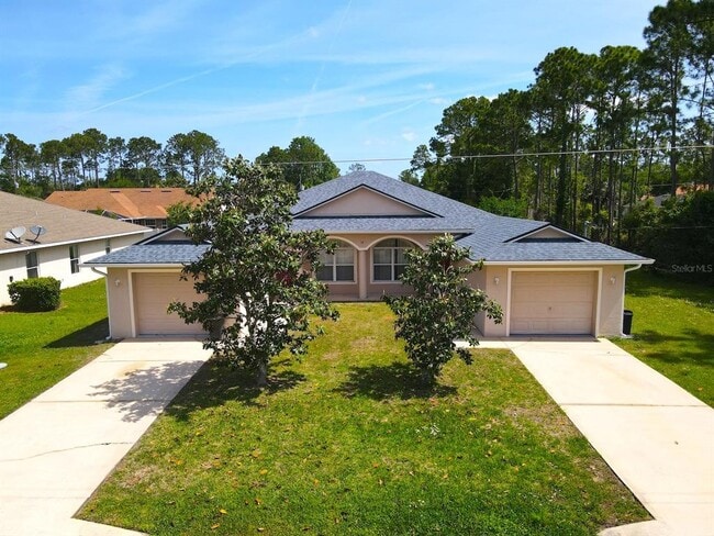 14 Buttonwood Ln in Palm Coast, FL - Building Photo - Building Photo